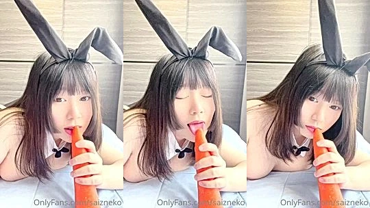 Thai slut sucks on a carrot