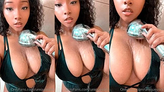 Uniquesora showers her big tits