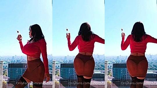 japanese model Anri Okita teasing her huge tits in red dress