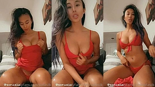 Sofia Silk striptease in her orange bikini on livestream