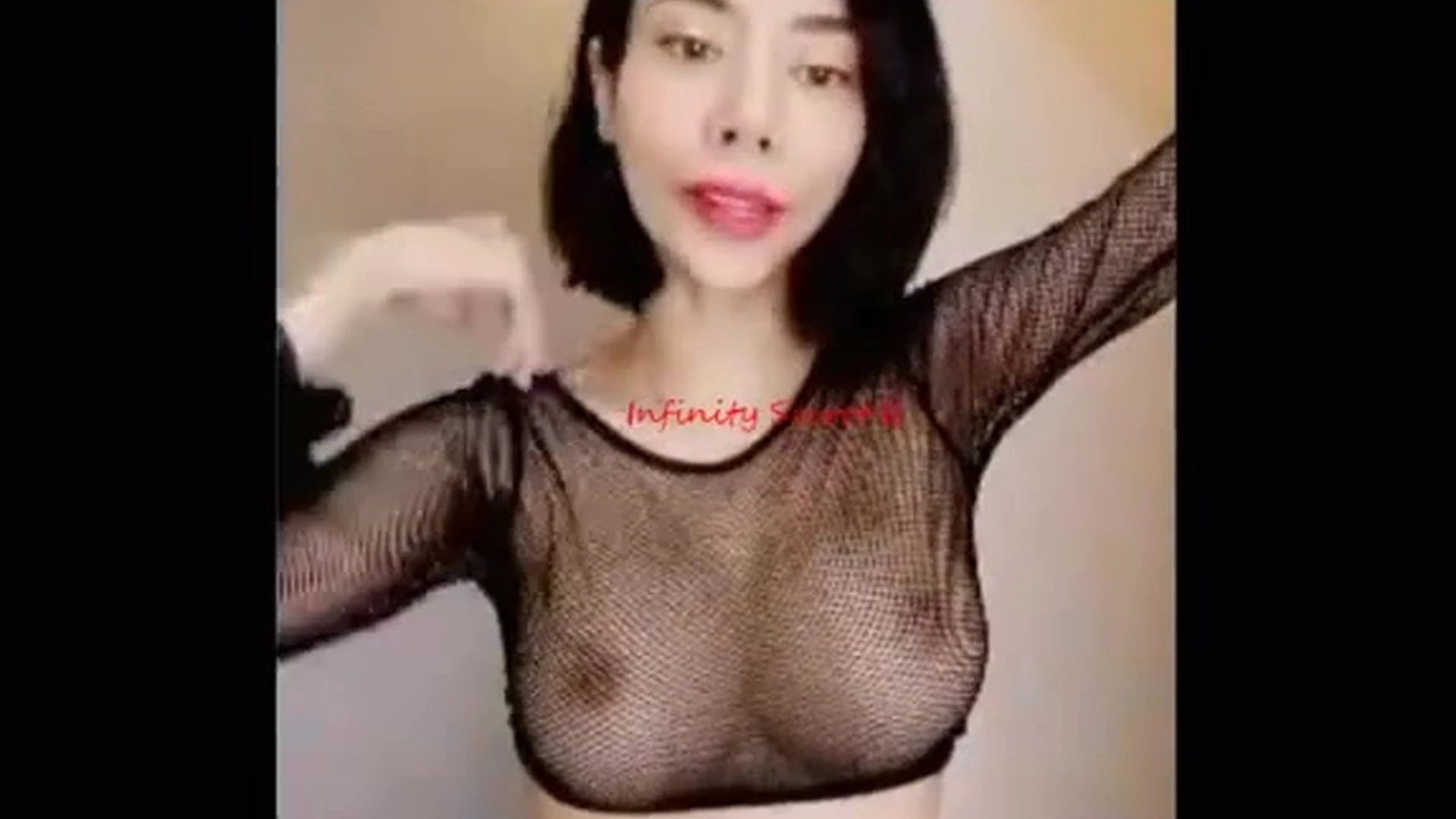 thai girl Jiraporn Ngamthuan teasing her naked tits in see-through top
