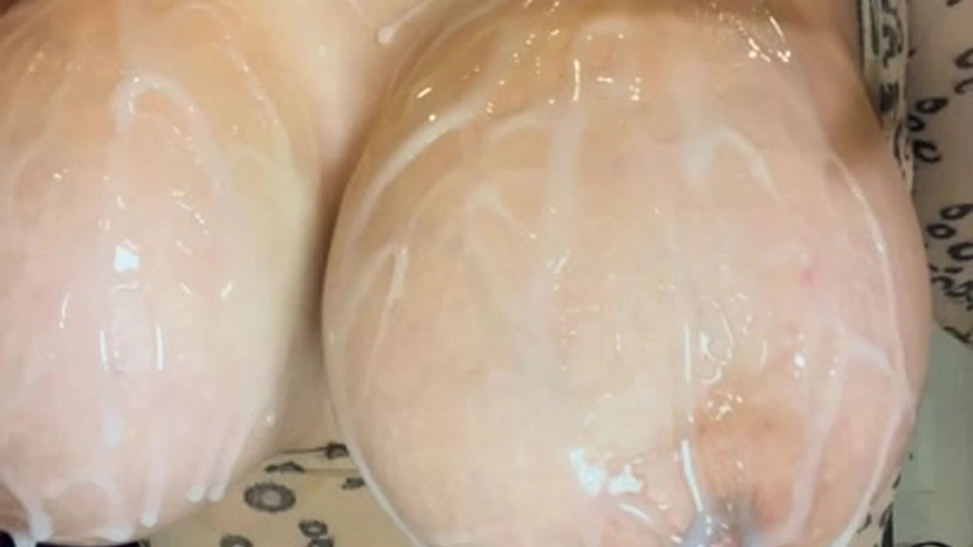 Yuu Sakura oiling up her big tits and dildo play