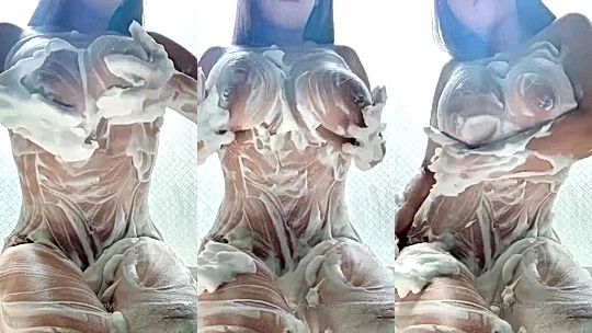 Yuu Sakura soaping up her huge naked tits