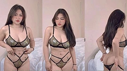 Beautiful chick Ngan Nguyen teasing her sexy body in string lingerie
