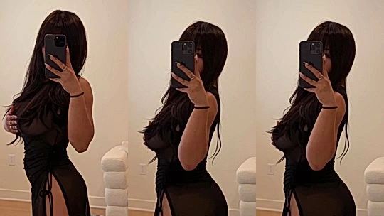 Ngan Nguyen showing off her black see-through bodysuit